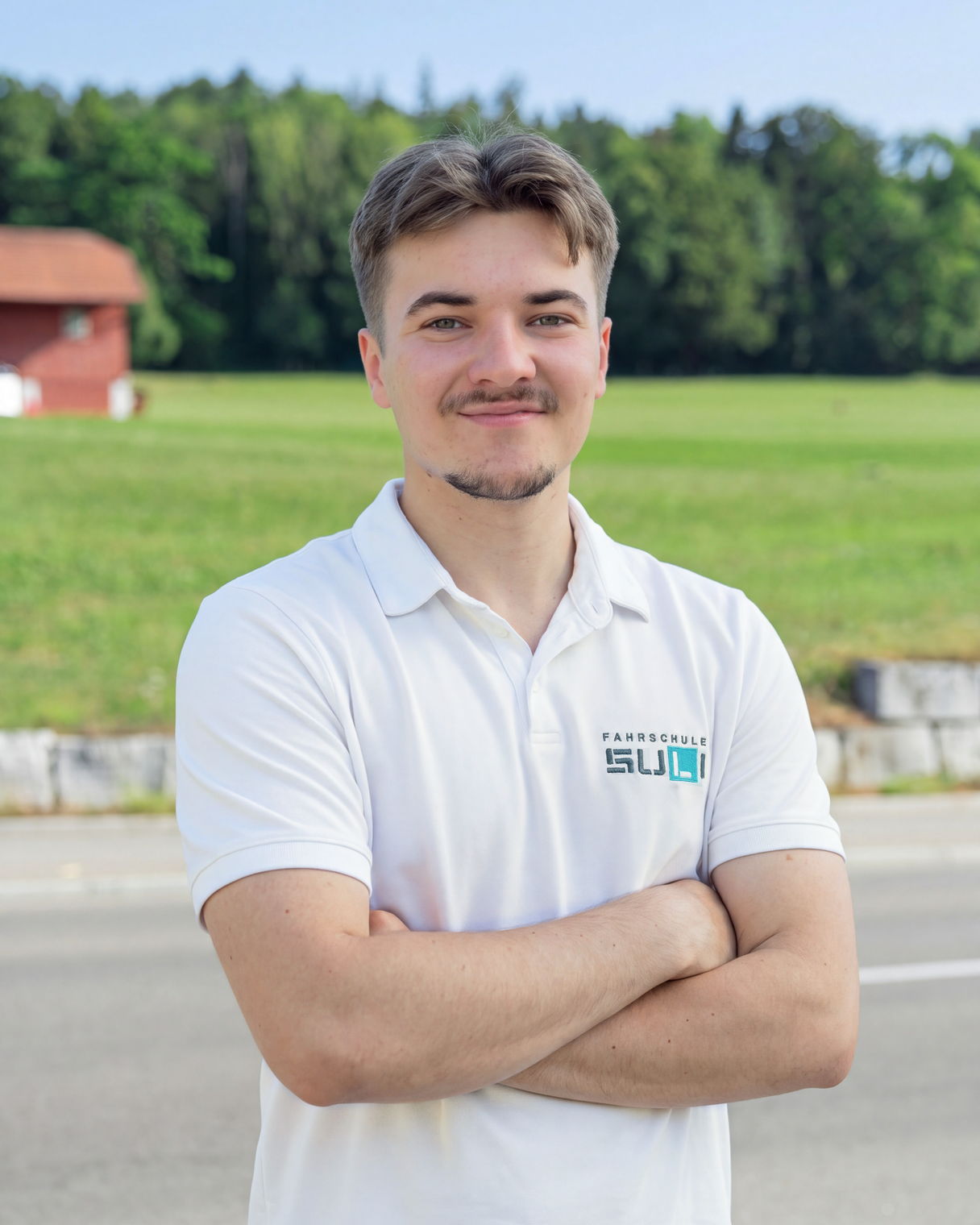 Porträt von Jul, Nothelferinstruktor bei der Fahrschule SULI.